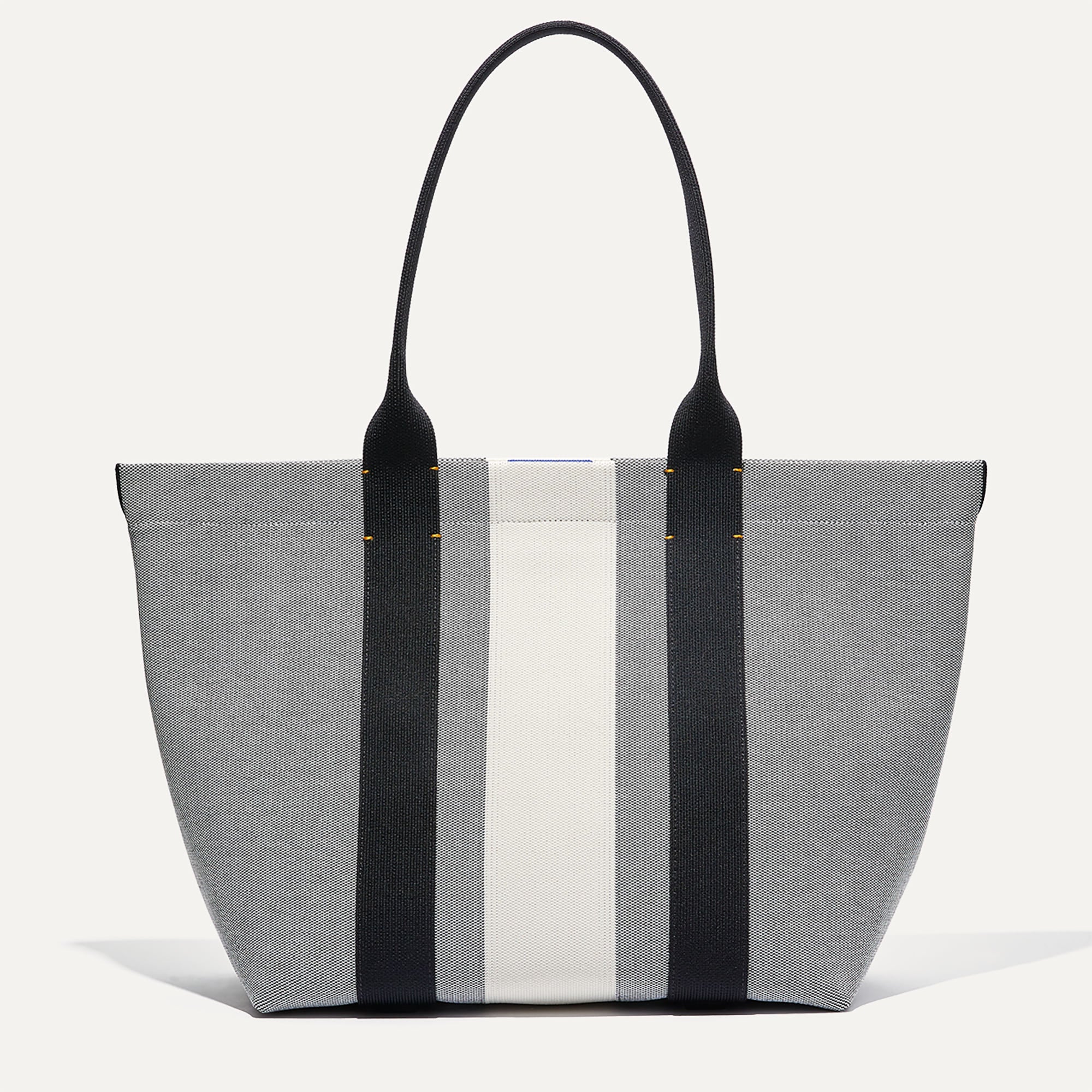 PLP |The Essential Tote in Grey Mist shown from the front.