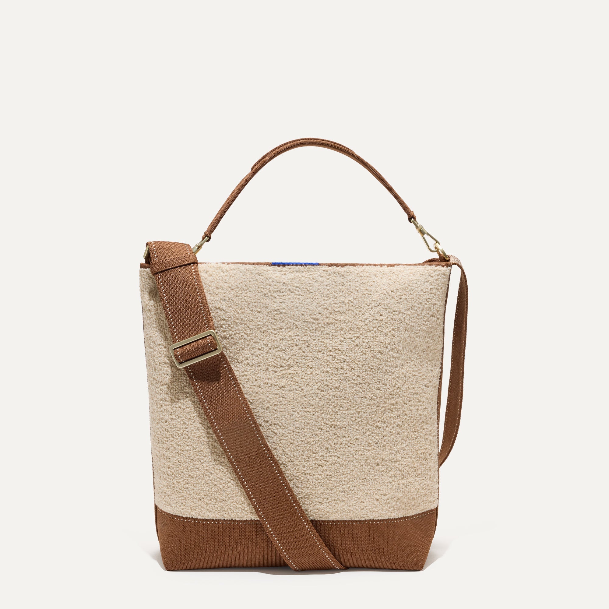 PLP |The Bucket Bag in Honeybun Bouclé shown from the front.