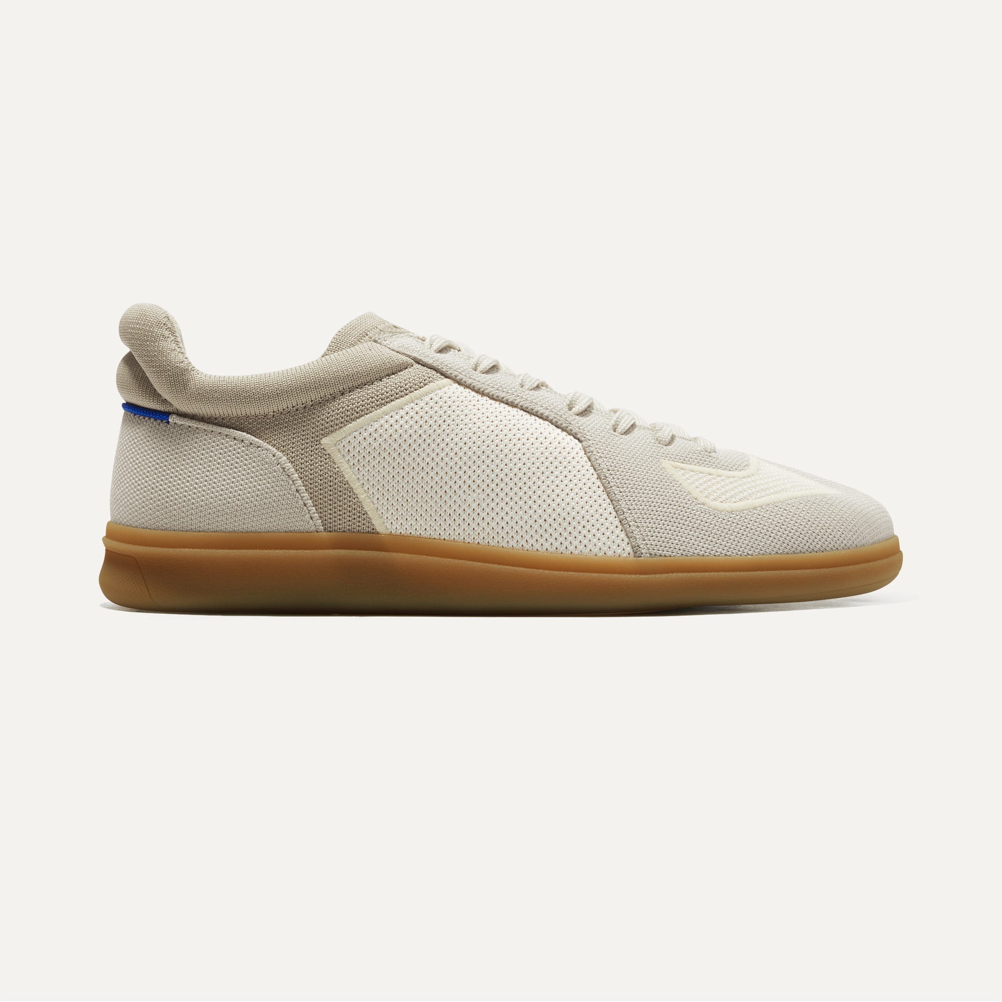 The RS01 Sneaker in Pelican Grey shown from the side.