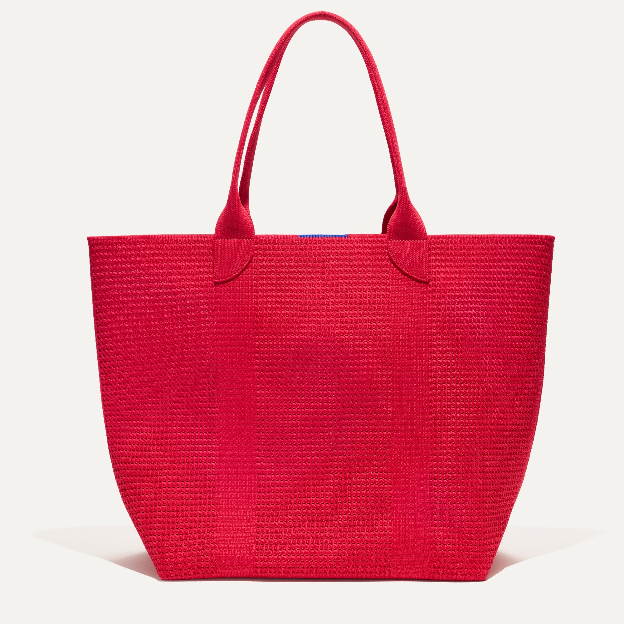 PLP |The Lightweight Tote in Lollipop Perf shown from the front. 