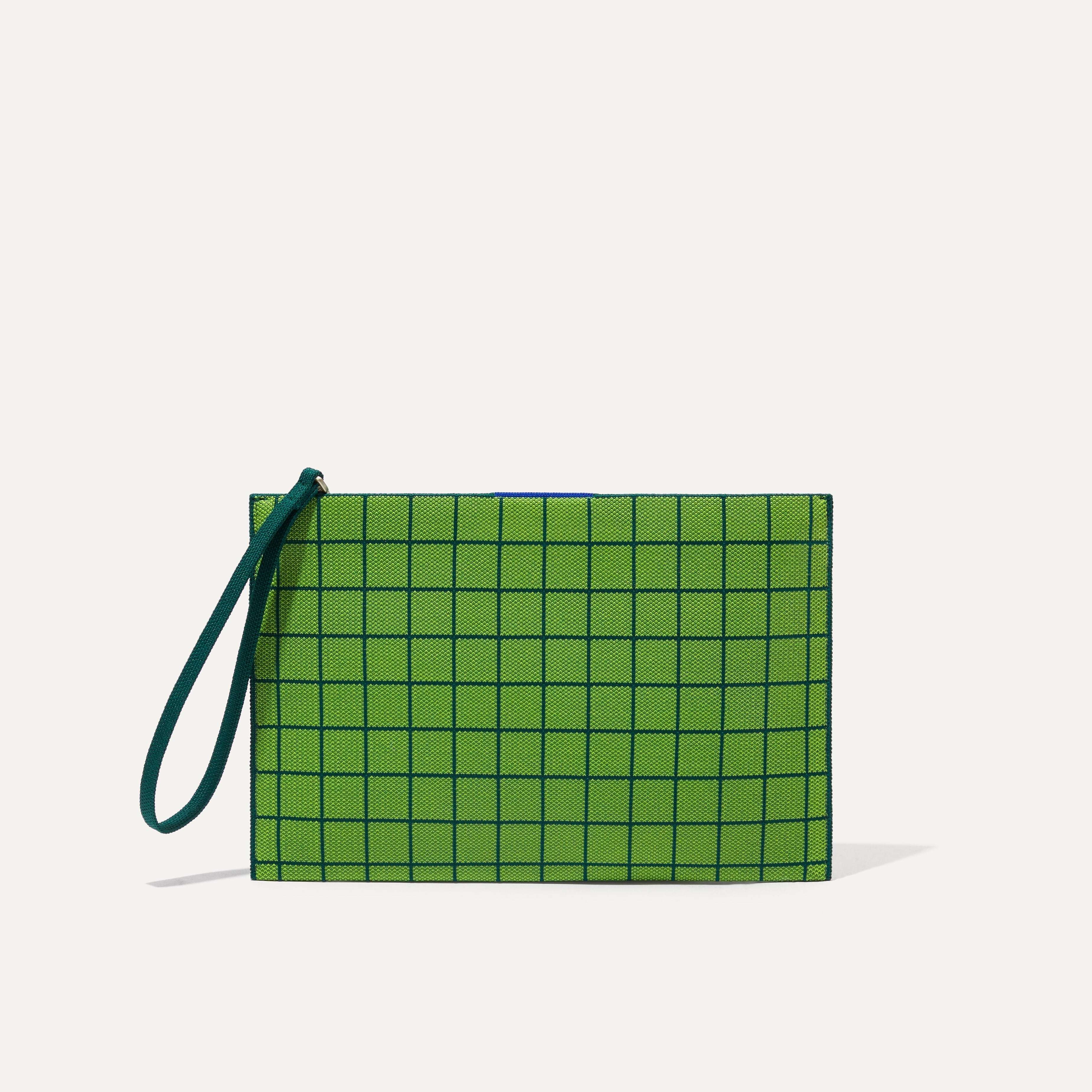 PLP |The Wristlet in Leaf Green Windowpane shown from the front.