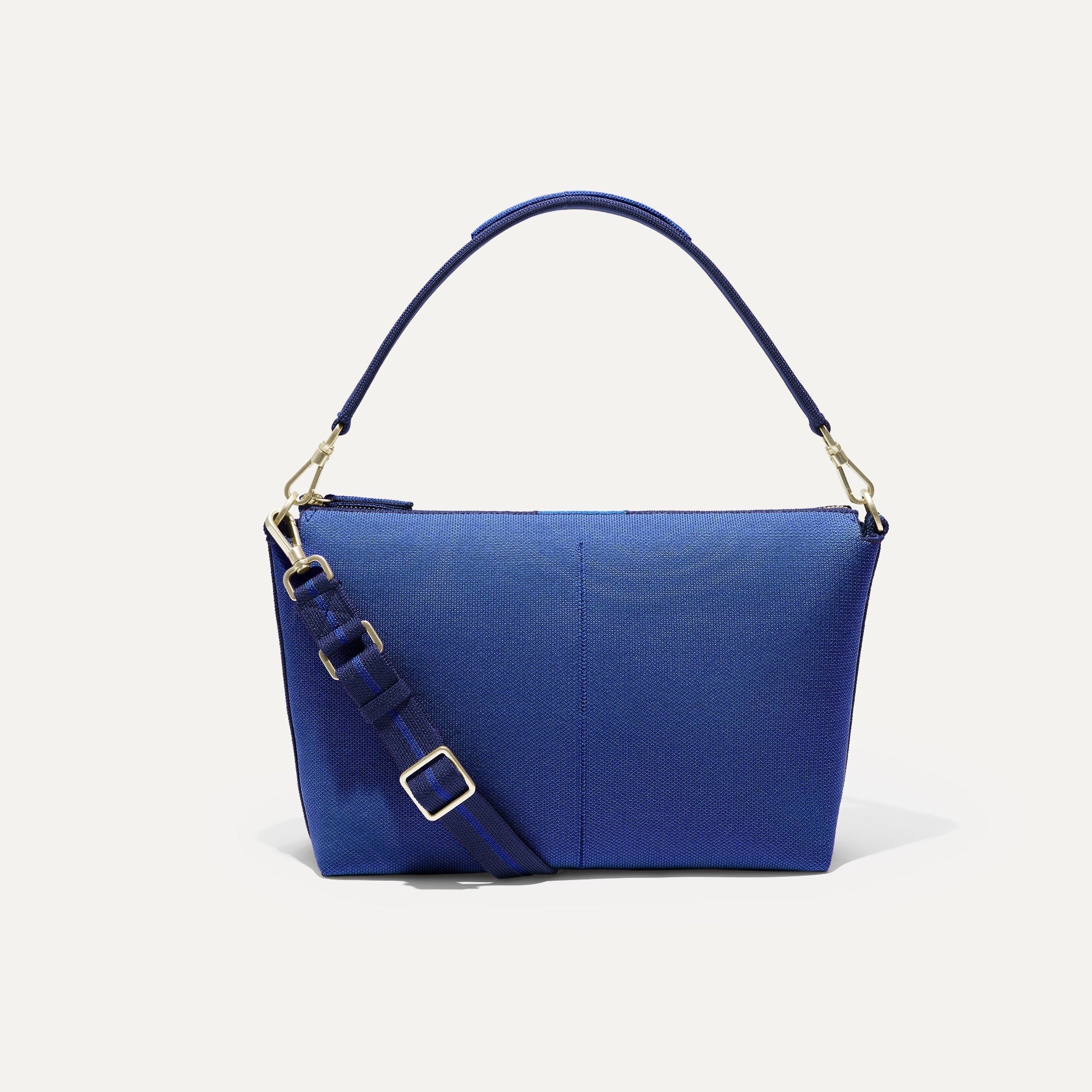 PLP |The Daily Crossbody Bag in Varsity Blue shown from the front.