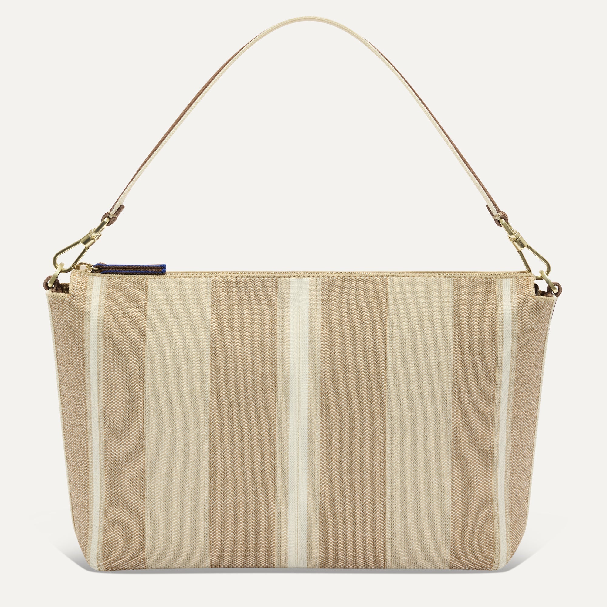 PDP |The Daily Crossbody Bag in Oat Latte shown from the front.