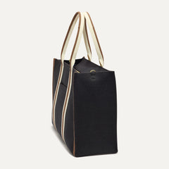 The Classic Tote in Black Coffee, shown from the side.