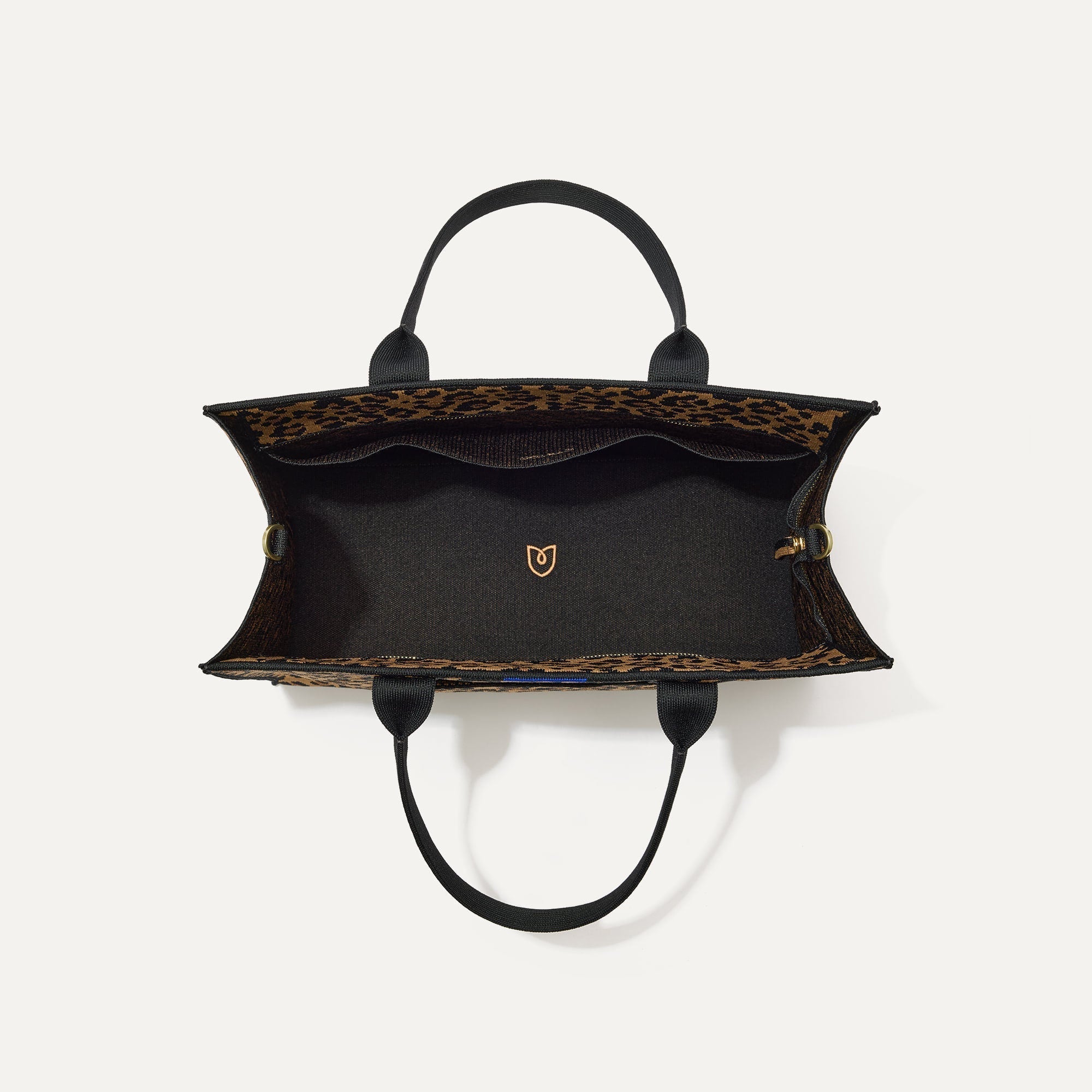 The Classic Tote in Toasty Cat, shown from above, with the interior exposed.