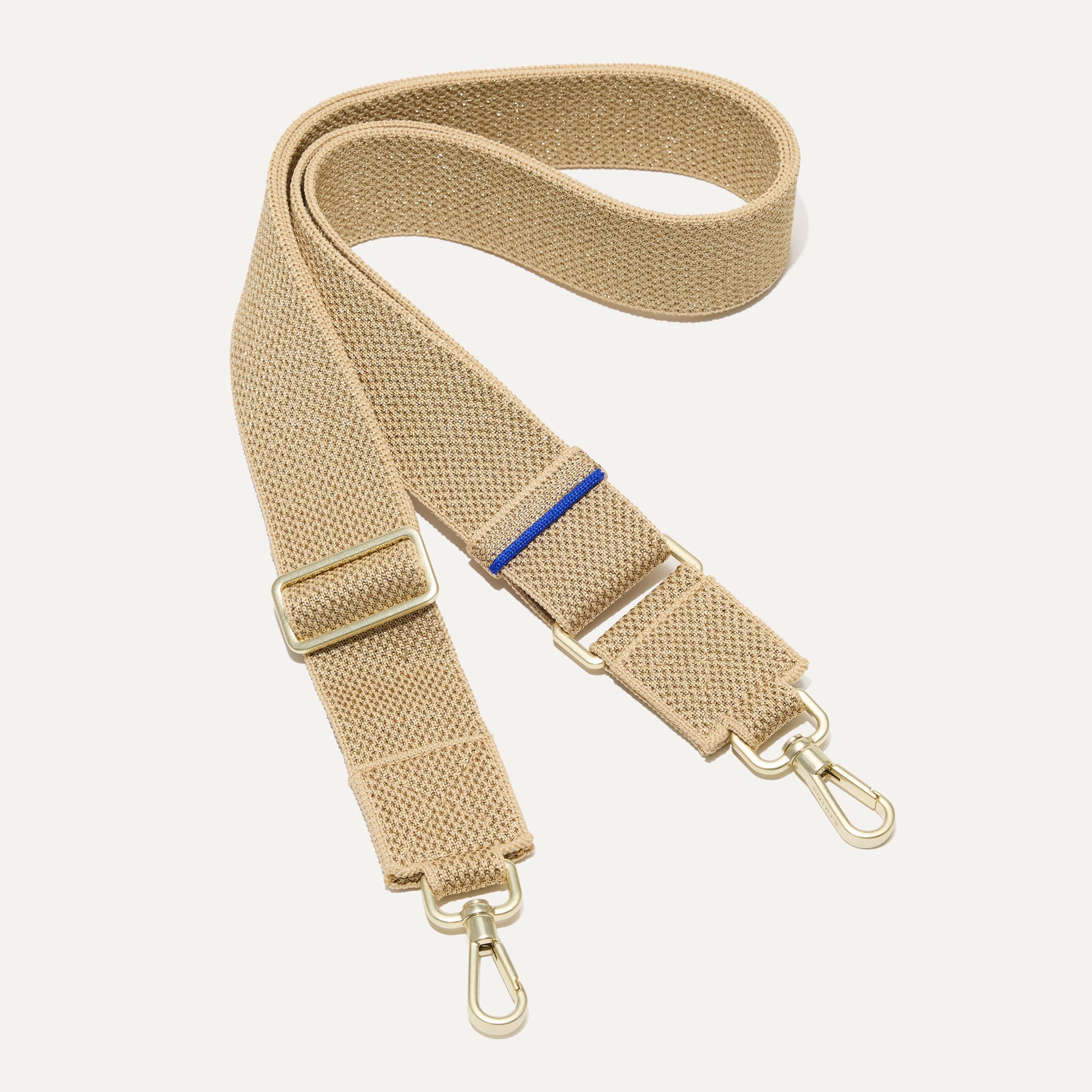 The Crossbody Strap in Gold Dust.
