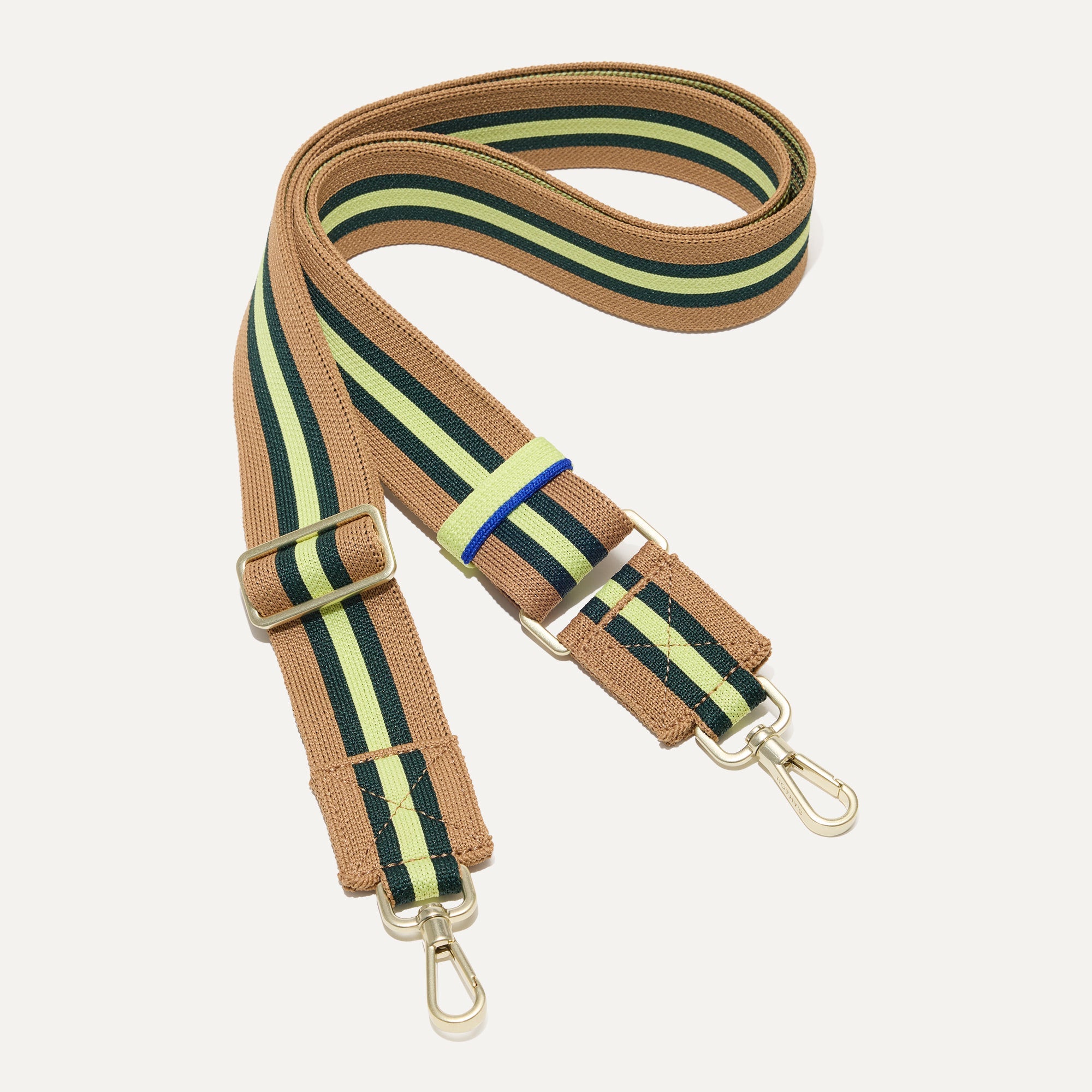 The Crossbody Strap in Neon Pine Stripe.