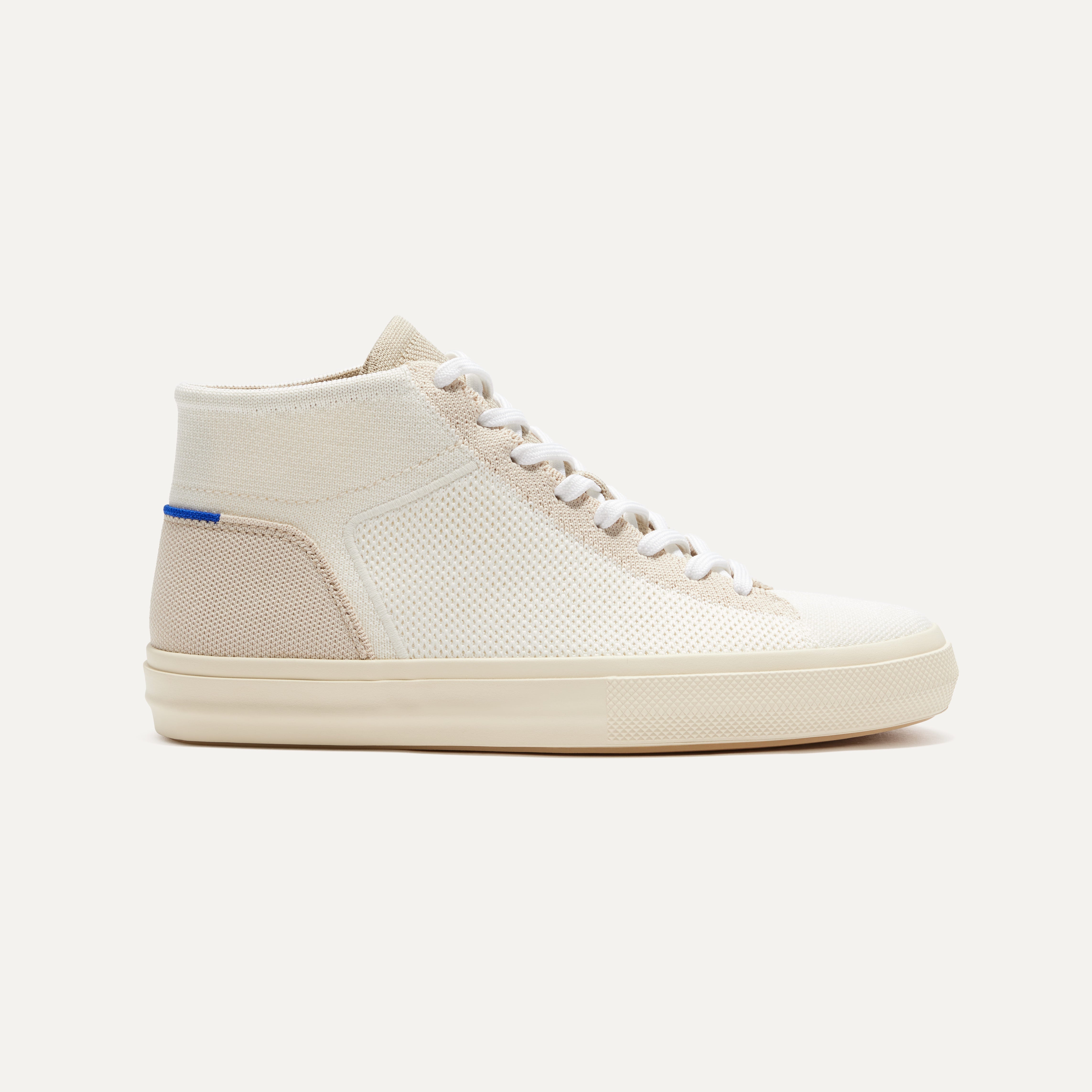 The High Top Sneaker in Sand Dune shown from the side. 