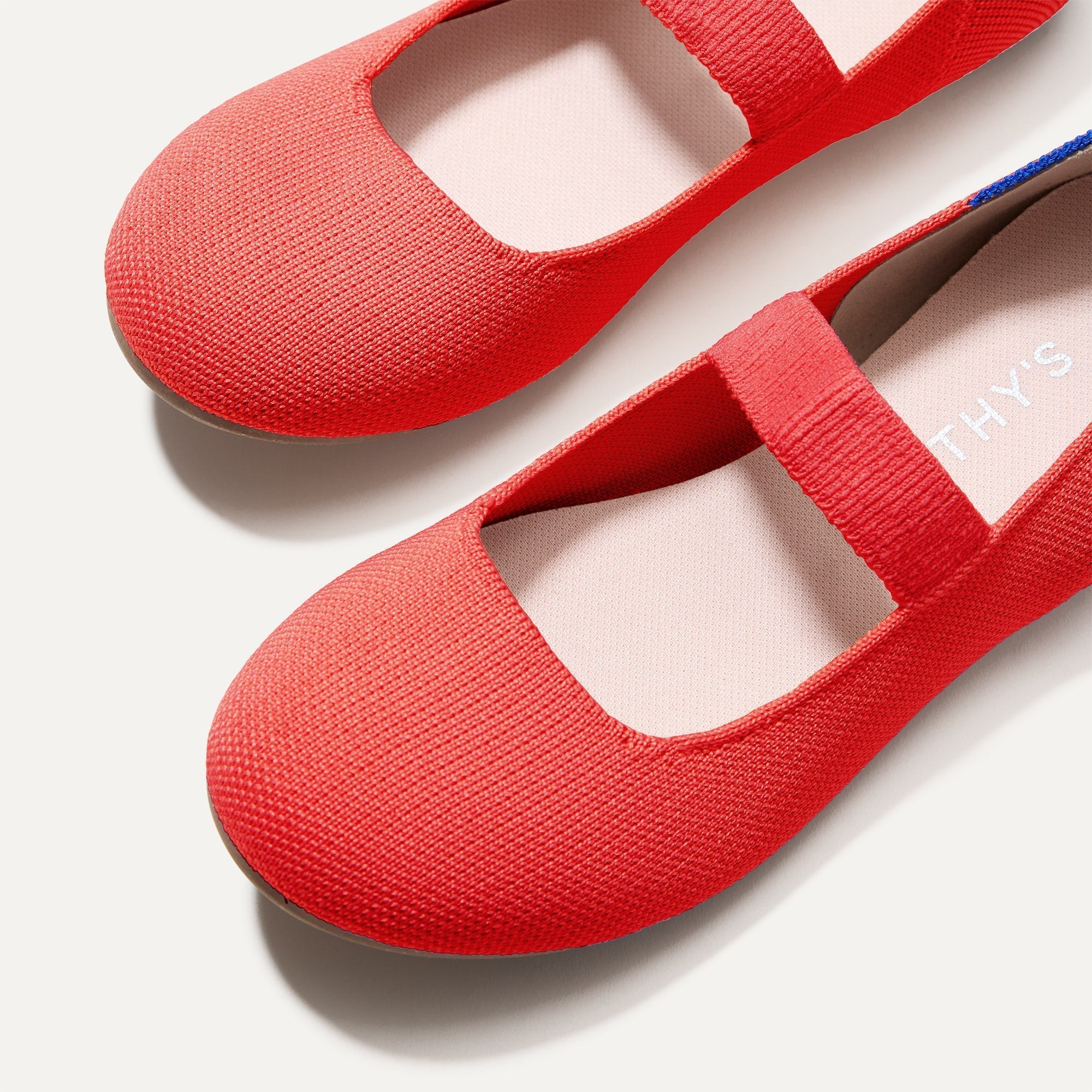 Close up of the toe and vamp of The Kids Mary Jane in Glamour Red.