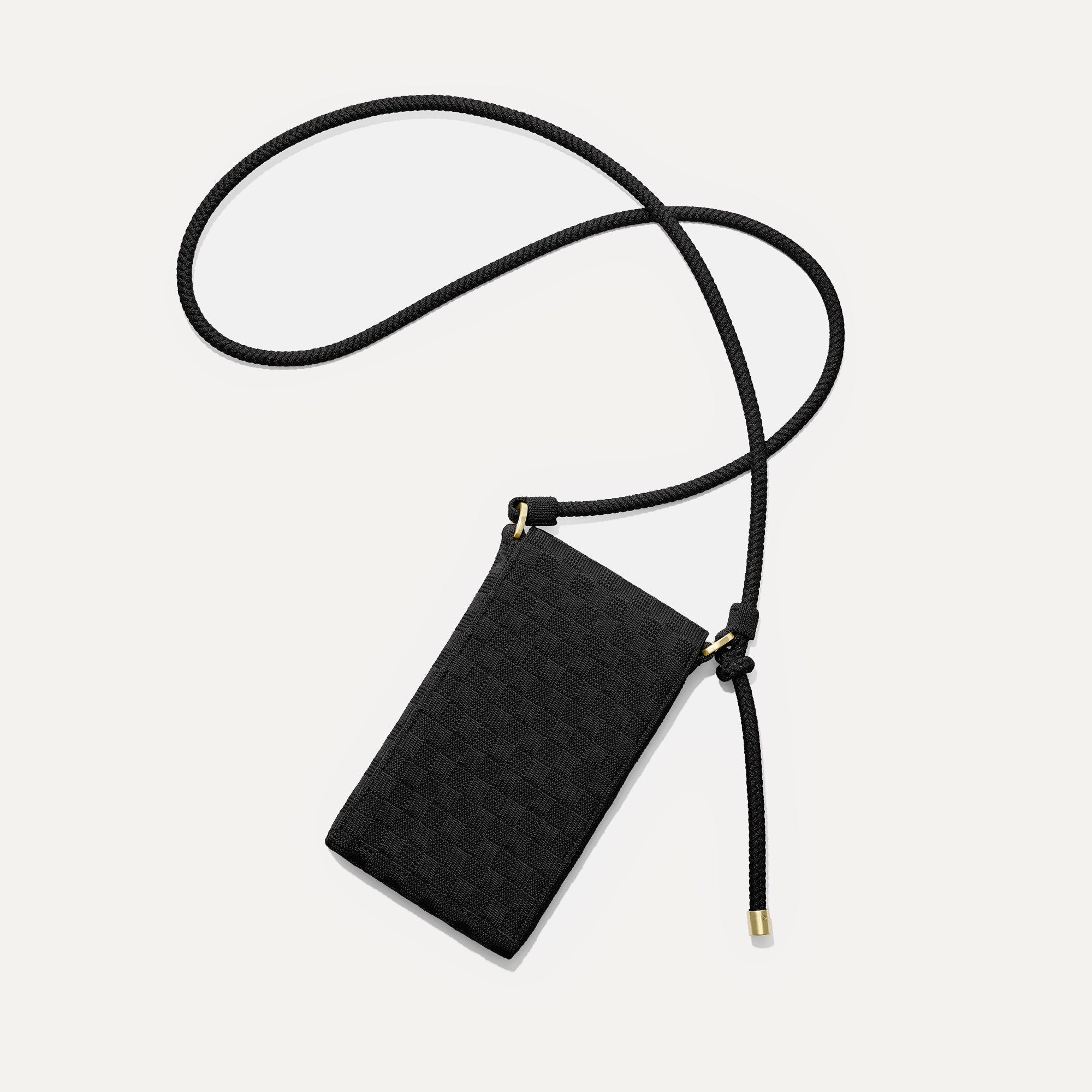 The Phone Crossbody in Black Sand shown from above.