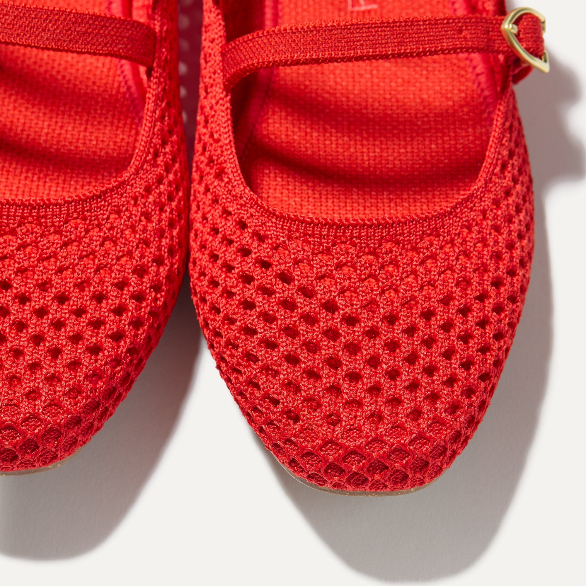 Close up of the toe and vamp of The Double Buckle Mary Jane in Bright Red Mesh.