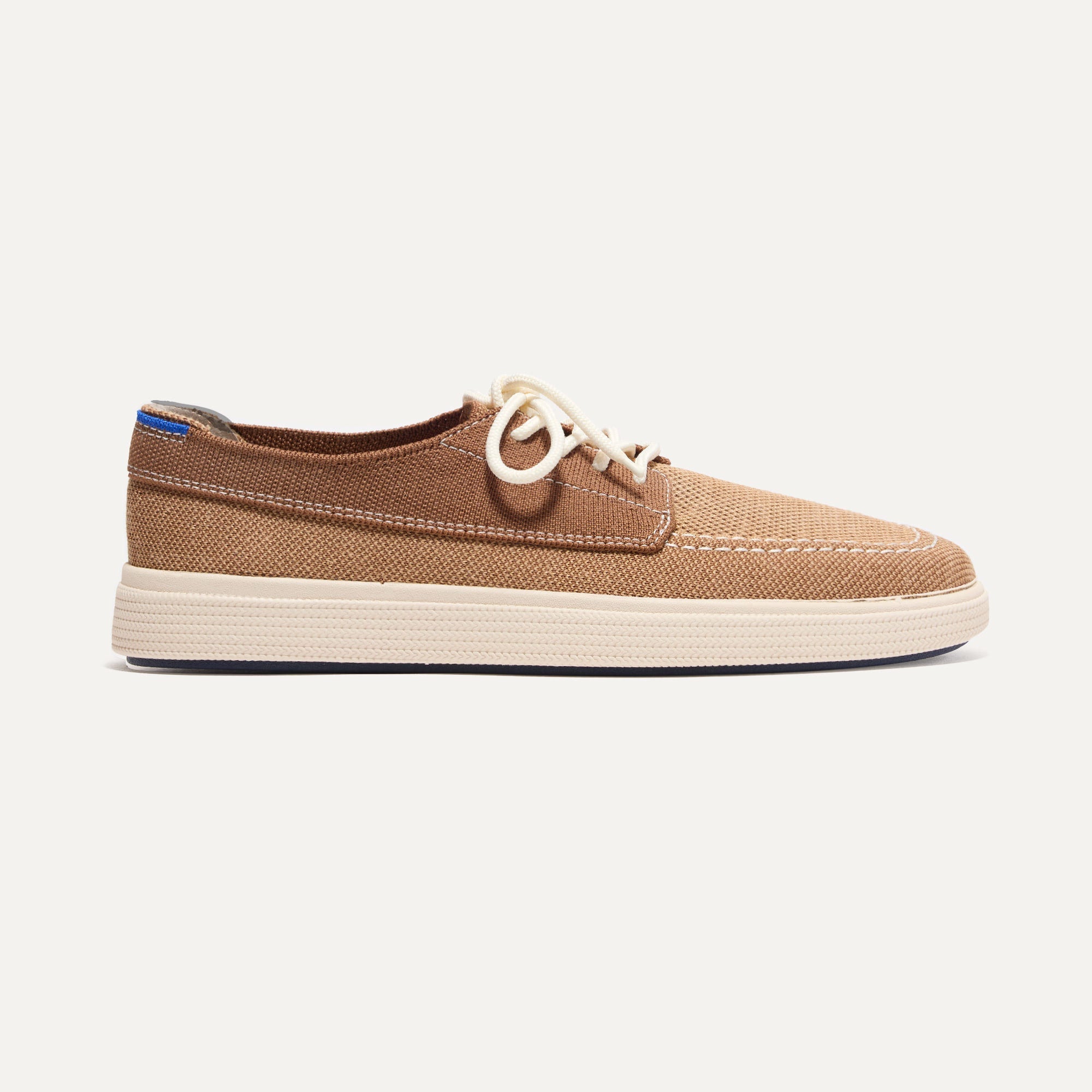 The Ravello Boat Shoe in Nautical Brown shown from the side. 