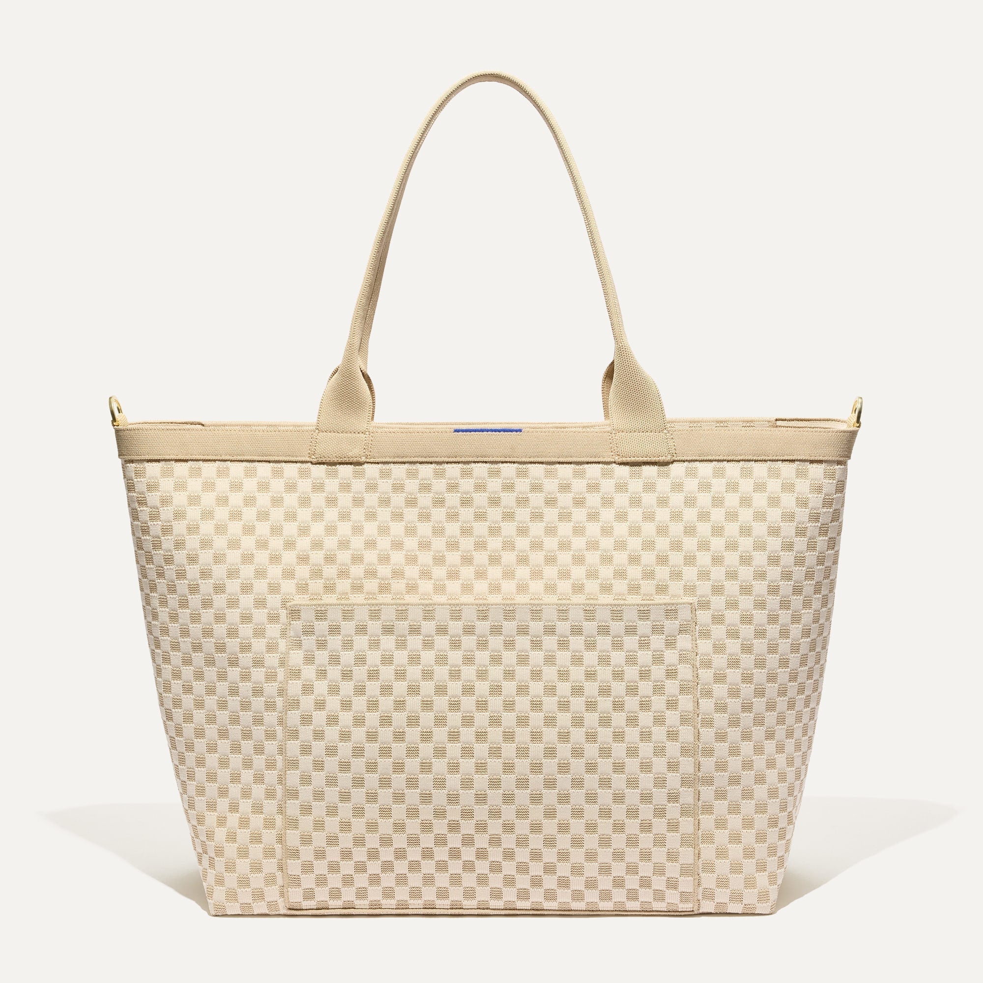 PDP |The Zip Travel Tote in  Parchment Basketweave shown from the front.