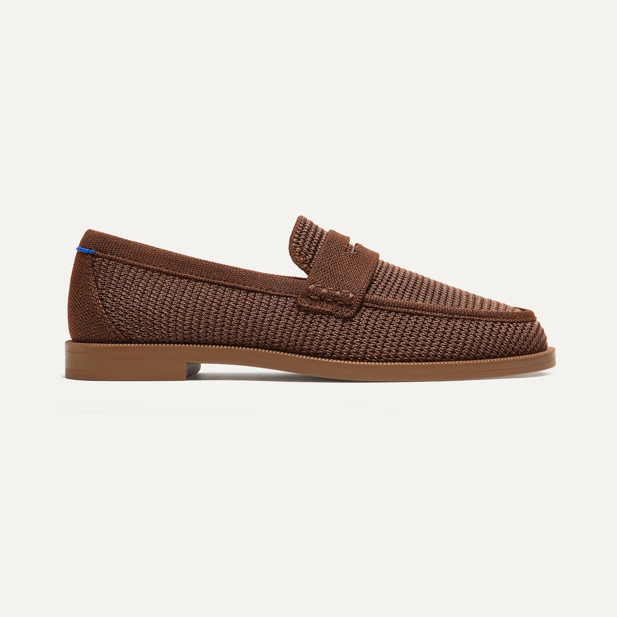 side | The Penny Loafer in Cinnamon Raffia-Knit shown from the side.