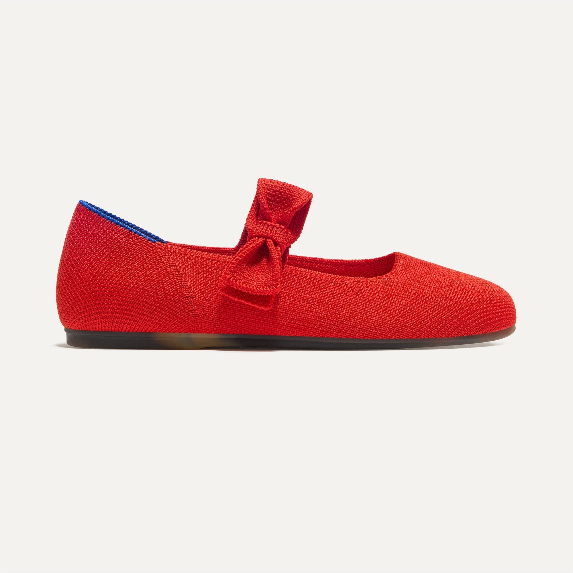 side | The Kids Tux Bow Mary Jane in Bright Red shown from the side.