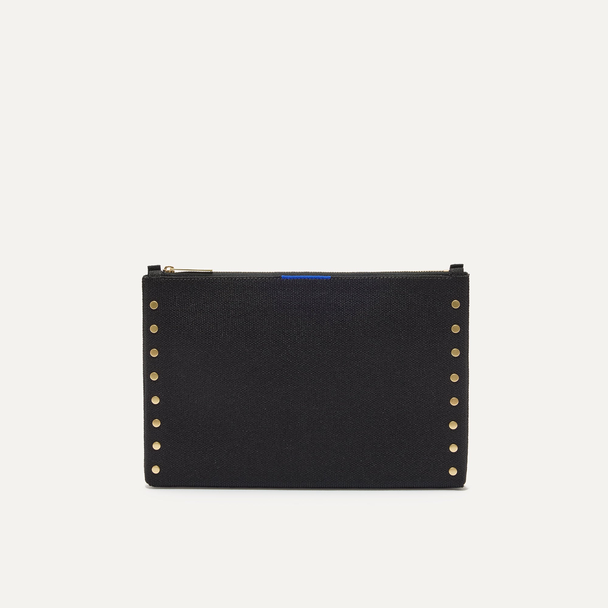 PLP |The Convertible Clutch in Studded Black, shown from the front.