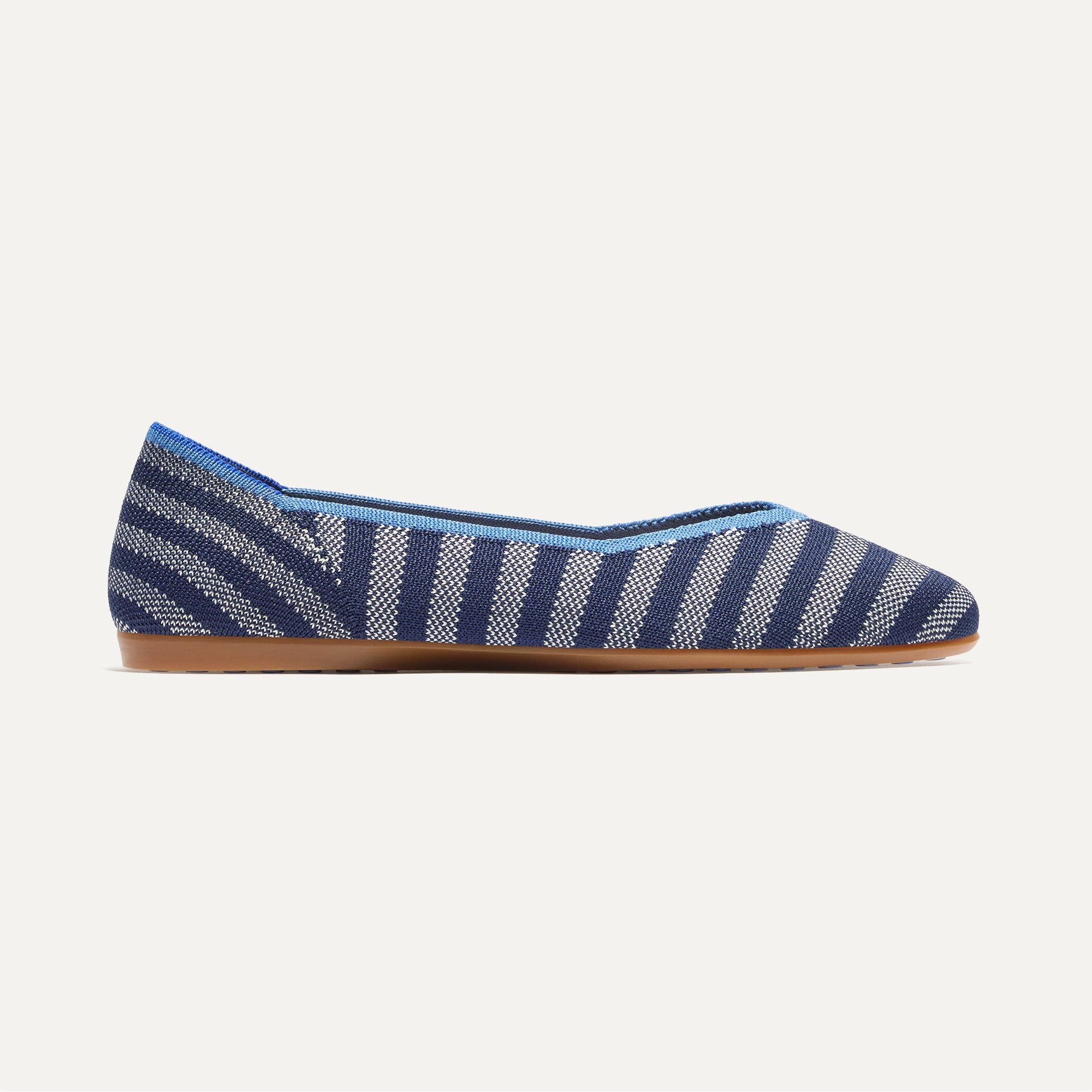 side | The Daily Flat in Harbor Cabana Stripe shown from the side. 