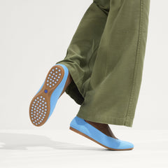 hover | Model wearing The Daily Flat in Robin Blue. 