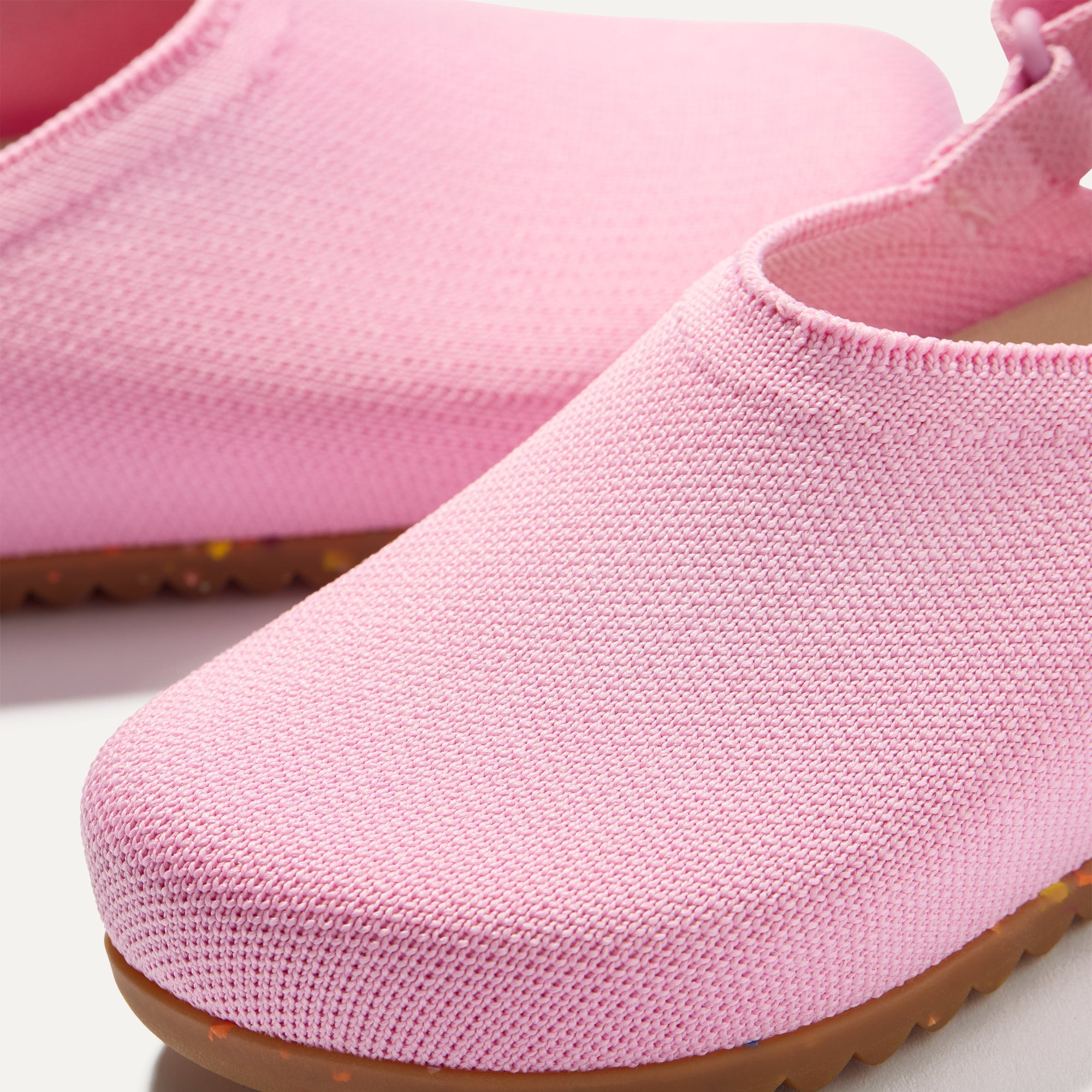 Close up of the rounded topline of The Kids Clog in Tutu. 