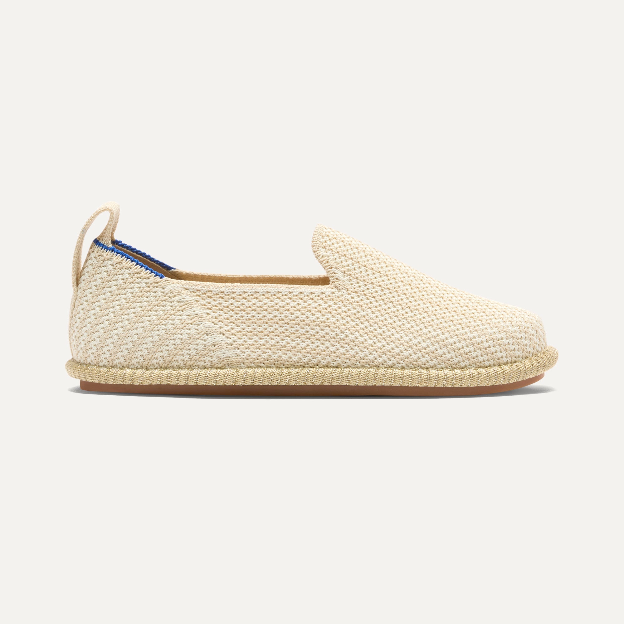 side | The Mini Loafer in Cream Puff Stripe shown from a side view showing the outsole.